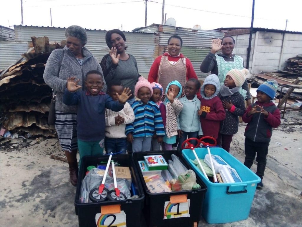 Children recieve presents in Soputh Africa